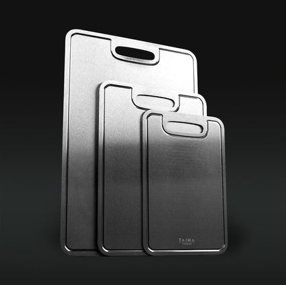Three Titanium cutting boards with handles