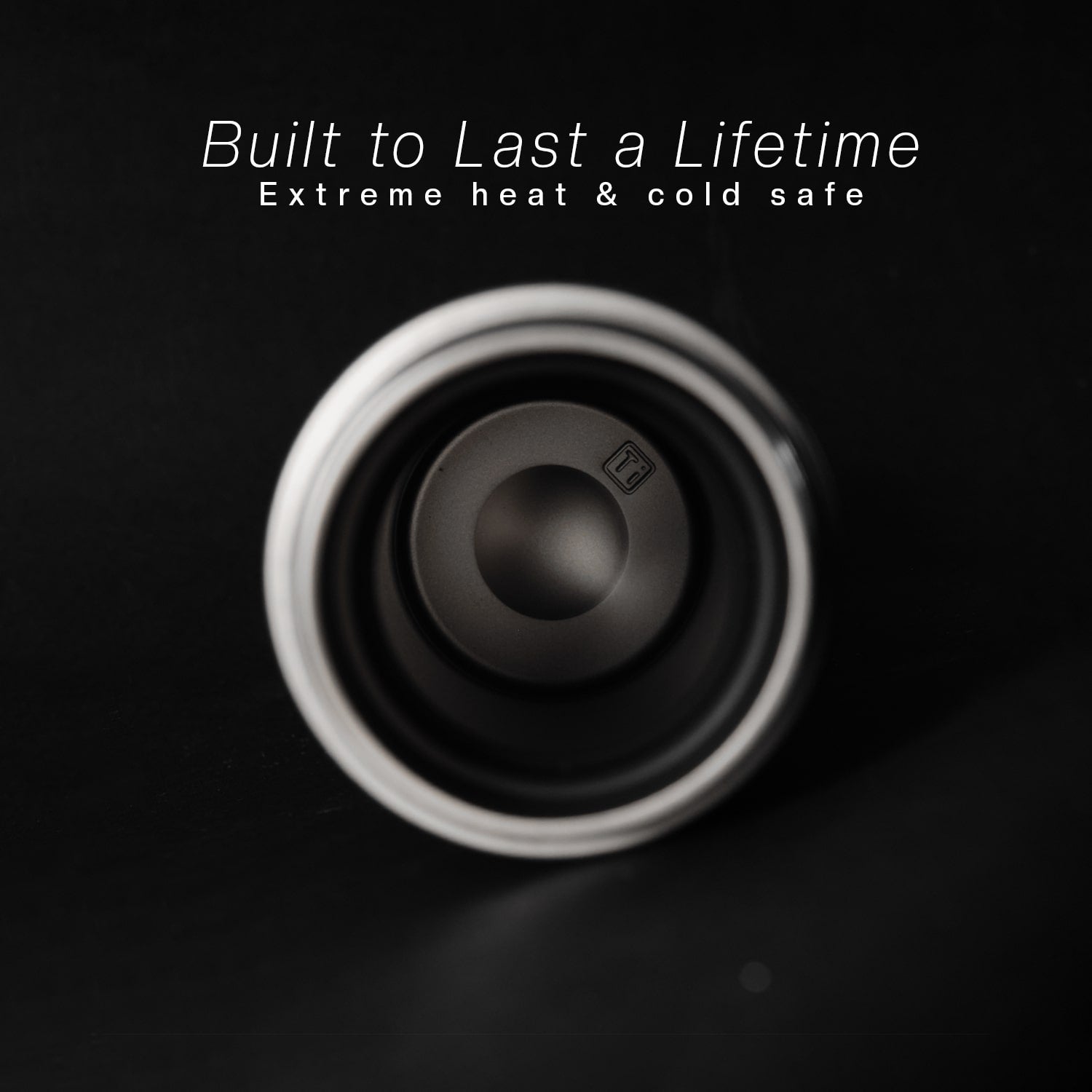Titanium thermos with text 'Built to Last a Lifetime, Extreme heat & cold safe'